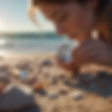 A person examining a beach gemstone under sunlight to reveal its luster.