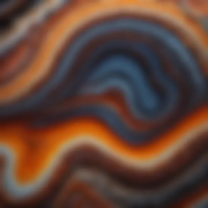 Close-up view of a raw agate showcasing its intricate banding and colors