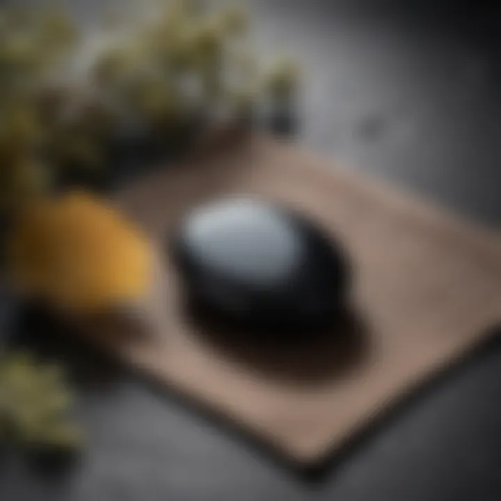 A serene setting with a black obsidian worry stone placed on a meditation mat, symbolizing calm and mindfulness.