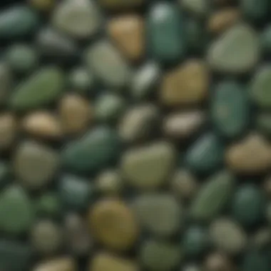 Intricate Surface Patterns of Green Tumbled Stones Close-up of a polished green tumbled stone highlighting its surface and color variations
