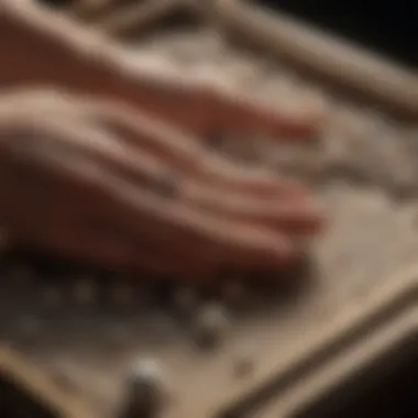 A collector inspecting pearls in a jewelry box