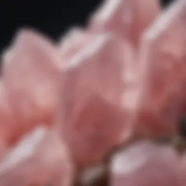 A close-up of raw rose quartz crystals, showcasing their natural beauty and variations in color.