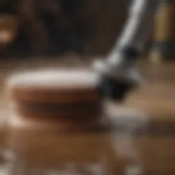 A close-up view of a wet sander in action, showcasing the water spray mechanism.