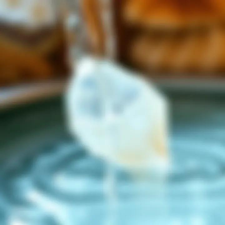 A close-up of a crystal being gently rinsed under water